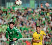 13 June 2015; Kyle Lafferty, Northern Ireland, in action against Laszio Sepsi, Romania. UEFA EURO 2016 Championship Qualifier, Group F, Northern Ireland v Romania, Windsor Park, Belfast, Co. Antrim. Picture credit: Oliver McVeigh / SPORTSFILE