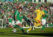 13 June 2015; Jamie Ward, Northern Ireland, in action against Laszio Sepsi , Romania. UEFA EURO 2016 Championship Qualifier, Group F, Northern Ireland v Romania, Windsor Park, Belfast, Co. Antrim. Picture credit: Oliver McVeigh / SPORTSFILE