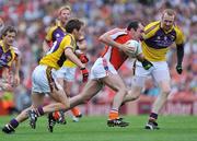 9 August 2008; Martin O'Rourke, Armagh, in action against Redmond Barry, left, and Brendan Doyle, Wexford. GAA Football All-Ireland Senior Championship Quarter-Final, Armagh v Wexford, Croke Park, Dublin. Picture credit: Pat Murphy / SPORTSFILE