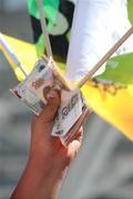 15 August 2008; A vendor sells flags outside the 'Birds Nest' - National Stadium for the start of the track and field events. Beijing 2008 - Games of the XXIX Olympiad, National Stadium, Olympic Green, Beijing, China. Picture credit: Ray McManus / SPORTSFILE