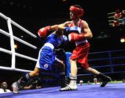 15 August 2008; John Joe Nevin, Ireland, misses with a right cross and is hit by his opponent Badar-Uugan, from Mongolia, in blue, during the 1 of 8 preliminaires of the Bantam weight, 54 kg, contest. Nevin was given a standing count of eight as aresult of this encounter in the second round. Beijing 2008 - Games of the XXIX Olympiad, Beijing Workers Gymnasium, Olympic Green, Beijing, China. Picture credit: Ray McManus / SPORTSFILE