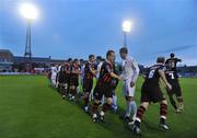 15 August 2008; Players of Bohemians and Drogheda United shake hands with each other before the start of the game which was delayed due to floodlight failure. FAI Ford Cup Fourth Round, Bohemians v Drogheda United, Dalymount Park, Dublin. Picture credit: David Maher / SPORTSFILE