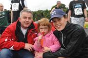 16 August 2008; Brian and Lillian Whelan with their daughter Ava, 3, from Kildare, before the start of the Lifestyle adidas Race Series - Frank Duffy 10 Mile Road Race. Phoenix Park, Dublin. Picture credit: Ray Lohan / SPORTSFILE  *** Local Caption ***