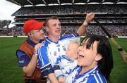 17 August 2008; Waterford's Eoin Kelly celebrates with his girlfriend Sharon Carey, son Sean, age 2, and John Carey, left, after the match. GAA Hurling All-Ireland Senior Championship Semi-Final, Tipperary v Waterford, Croke Park, Dublin. Picture credit: Stephen McCarthy / SPORTSFILE *** Local Caption *** john carey