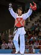 17 June 2015; Alexey Denisenko, Russia, celebrates defeating Servet Tazegul, Turkey, during their Men's Taekwondo 68kg Contest for Bronze Medal B bout. 2015 European Games, Crystal Hall, Baku, Azerbaijan. Picture credit: Stephen McCarthy / SPORTSFILE