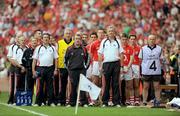 10 August 2008; The Cork management backroom staff and substitutes stand together for Amhran na bhFiann. GAA Hurling All-Ireland Senior Championship Semi-Final, Kilkenny v Cork, Croke Park, Dublin. Picture credit: Stephen McCarthy / SPORTSFILE