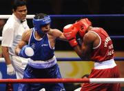 20 August 2008; Darren Sutherland, Ireland, in action against Alfonso Blanco Parra, in red from Venezuela, during their quarter-final bout of the Middle weight, 75kg, contest. Beijing 2008 - Games of the XXIX Olympiad, Beijing Workers Gymnasium, Olympic Green, Beijing, China. Picture credit: Ray McManus / SPORTSFILE