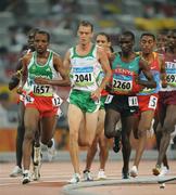 20 August 2008; Alistair Cragg, 2041, Ireland, in action alongside Tariku Bekele, 1657, of Ethiopia, and Eliud Kipchoge, 2260, of Kenya, during his heat of the Men's 5000m, where he finished 6th in a time of 13:38.57 and qualified for the final. Beijing 2008 - Games of the XXIX Olympiad, National Stadium, Olympic Green, Beijing, China. Picture credit: Brendan Moran / SPORTSFILE