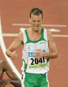 20 August 2008; Alistair Cragg, 2041, Ireland, reacts as he crosses the finish line during his heat of the Men's 5000m, where he finished 6th in a time of 13:38.57 and qualified for the final. Beijing 2008 - Games of the XXIX Olympiad, National Stadium, Olympic Green, Beijing, China. Picture credit: Brendan Moran / SPORTSFILE