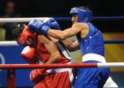 20 August 2008; James Degale, Great Britain, in action against Bakhtiyar Artayev, in red from Kazakastan, during their quarter-final bout of the Middle weight, 75kg, contest. Beijing 2008 - Games of the XXIX Olympiad, Beijing Workers Gymnasium, Olympic Green, Beijing, China. Picture credit: Ray McManus / SPORTSFILE