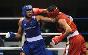 20 August 2008; James Degale, Great Britain, in action against Bakhtiyar Artayev, in red from Kazakastan, during their quarter-final bout of the Middle weight, 75kg, contest. Beijing 2008 - Games of the XXIX Olympiad, Beijing Workers Gymnasium, Olympic Green, Beijing, China. Picture credit: Ray McManus / SPORTSFILE