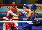 22 August 2008; Paddy Barnes, Ireland, in action against Zou Sheming, in blue, China, during their semi-final bout in the Light Fly weight, 48kg, contest. Beijing 2008 - Games of the XXIX Olympiad, Beijing Workers' Gymnasium, Olympic Green, Beijing, China. Picture credit: Brendan Moran / SPORTSFILE