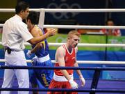 22 August 2008; Paddy Barnes, Ireland, glances down at the judges after Zou Sheming, China, defeated him in their semi-final bout in the Light Fly weight, 48kg, contest. Beijing 2008 - Games of the XXIX Olympiad, Beijing Workers' Gymnasium, Olympic Green, Beijing, China. Picture credit: Brendan Moran / SPORTSFILE