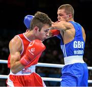 18 June 2015; Luke McCormack, Great Britain, rigtht, exchanges punches with Panagiotis Matsagkos, Greece, during their Men's Boxing Light 60kg Round of 32 bout. 2015 European Games, Crystal Hall, Baku, Azerbaijan. Picture credit: Stephen McCarthy / SPORTSFILE