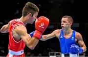 18 June 2015; Luke McCormack, Great Britain, rigtht, exchanges punches with Panagiotis Matsagkos, Greece, during their Men's Boxing Light 60kg Round of 32 bout. 2015 European Games, Crystal Hall, Baku, Azerbaijan. Picture credit: Stephen McCarthy / SPORTSFILE