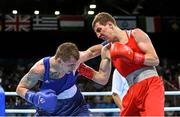 18 June 2015; Konstantin Bogomazov, Russia, right, exchanges punches with Edgaras Skurdelis, Lithuania, during their Men's Boxing Light 60kg Round of 32 bout. 2015 European Games, Crystal Hall, Baku, Azerbaijan. Picture credit: Stephen McCarthy / SPORTSFILE