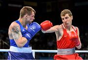 18 June 2015; Konstantin Bogomazov, Russia, right, exchanges punches with Edgaras Skurdelis, Lithuania, during their Men's Boxing Light 60kg Round of 32 bout. 2015 European Games, Crystal Hall, Baku, Azerbaijan. Picture credit: Stephen McCarthy / SPORTSFILE