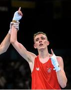 19 June 2015; Brendan Irvine, Ireland, is declared victorious following his Men's Boxing Light Fly 49kg Round of 16 bout with Tinko Banabakov, Bulgaria. 2015 European Games, Crystal Hall, Baku, Azerbaijan. Picture credit: Stephen McCarthy / SPORTSFILE