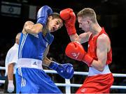 19 June 2015; Brendan Irvine, Ireland, right, exchanges punches with Tinko Banabakov, Bulgaria, during their Men's Boxing Light Fly 49kg Round of 16 bout. 2015 European Games, Crystal Hall, Baku, Azerbaijan. Picture credit: Stephen McCarthy / SPORTSFILE