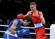 19 June 2015; Brendan Irvine, Ireland, right, exchanges punches with Tinko Banabakov, Bulgaria, during their Men's Boxing Light Fly 49kg Round of 16 bout. 2015 European Games, Crystal Hall, Baku, Azerbaijan. Picture credit: Stephen McCarthy / SPORTSFILE