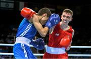 19 June 2015; Brendan Irvine, Ireland, right, exchanges punches with Tinko Banabakov, Bulgaria, during their Men's Boxing Light Fly 49kg Round of 16 bout. 2015 European Games, Crystal Hall, Baku, Azerbaijan. Picture credit: Stephen McCarthy / SPORTSFILE