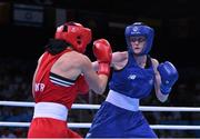 19 June 2015; Ceire Smith, Ireland, right, exchanges punches with Camilla Johansen, Norway, during their Women's Boxing Fly 51kg Round of 16 bout. 2015 European Games, Crystal Hall, Baku, Azerbaijan. Picture credit: Stephen McCarthy / SPORTSFILE