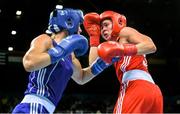 19 June 2015; Nouchka Fontijn, Netherlands, left, exchanges punches with Savannah Marshall, Great Britain, during their Women's Boxing Middle 75kg Round of 16 bout. 2015 European Games, Crystal Hall, Baku, Azerbaijan. Picture credit: Stephen McCarthy / SPORTSFILE