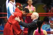 24 August 2008; Ireland's Kenneth Egan is presented with his silver medal by Patrick Hickey, president of the Olympic Council of Ireland and president of the European Olympic Committee, during the presentations in the Light Heavy weight, 81kg, category. Beijing 2008 - Games of the XXIX Olympiad, Beijing Workers' Gymnasium, Olympic Green, Beijing, China. Picture credit: Ray McManus / SPORTSFILE