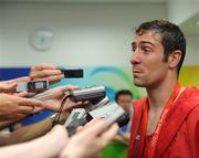 24 August 2008; Ireland's Kenneth Egan speaking to reporters after the presentation in the Light Heavy weight, 81kg, category. Beijing 2008 - Games of the XXIX Olympiad, Beijing Workers' Gymnasium, Olympic Green, Beijing, China. Picture credit: Ray McManus / SPORTSFILE