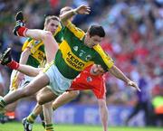 24 August 2008; Aidan O'Mahony, Kerry, fouls Graham Canty, Cork, during injury time to concede a penalty. GAA Football All-Ireland Senior Championship Semi-Final, Kerry v Cork, Croke Park, Dublin. Picture credit: David Maher / SPORTSFILE