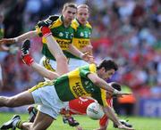 24 August 2008; Aidan O'Mahony, Kerry, fouls Graham Canty, Cork, during injury time to concede a penalty. GAA Football All-Ireland Senior Championship Semi-Final, Kerry v Cork, Croke Park, Dublin. Picture credit: David Maher / SPORTSFILEE