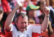 24 August 2008; A Cork supporter celebrates at the end of the game. GAA Football All-Ireland Senior Championship Semi-Final, Kerry v Cork, Croke Park, Dublin. Picture credit: David Maher / SPORTSFILE