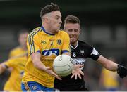 20 June 2015; Neil Collins, Roscommon, in action against Cian Breheny, Sligo. Connacht GAA Football Senior Championship, Semi-Final, Sligo v Roscommon, Markievicz Park, Sligo. Picture credit: Oliver McVeigh / SPORTSFILE