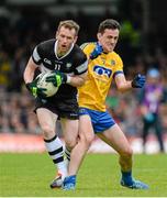 20 June 2015; Mark Breheny, Sligo, in action against Ciaran Cafferky, Roscommon. Connacht GAA Football Senior Championship, Semi-Final, Sligo v Roscommon, Markievicz Park, Sligo. Picture credit: Oliver McVeigh / SPORTSFILE