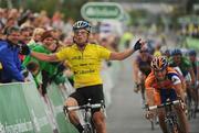 28 August 2008; Mark Cavendish, Team Columbia, celebrates as he crosses the line to win the second stage of the Tour of Ireland into Loughrea, Co. Galway, ahead of second place Michael van Staeyen, Rabobank, right. 2008 Tour of Ireland - Stage 2, Thurles - Loughrea. Picture credit: Stephen McCarthy / SPORTSFILE