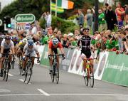 30 August 2008; Russell Downing, Pinarello CandiTV, celebrates as he approaches the line on his way to winning the fourth stage of the Tour of Ireland. 2008 Tour of Ireland - Stage 4, Limerick - Dingle. Picture credit: Stephen McCarthy / SPORTSFILE