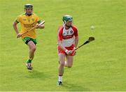 21 June 2015; Brendan Quigley, Derry, in action against Danny Cullen, Donegal. Ulster GAA Hurling Senior Championship, Quarter-Final, Donegal v Derry, Celtic Park, Derry. Picture credit: Oliver McVeigh / SPORTSFILE