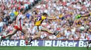 31 August 2008; Ciaran Lyng, Wexford, beats Colin Holmes, Tyrone to score his side's first goal. GAA Football All-Ireland Senior Championship Semi-Final, Tyrone v Wexford, Croke Park, Dublin. Picture credit: David Maher / SPORTSFILE