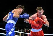 23 June 2015; Adam Nolan, Ireland, right, exchanges punches with Josh Kelly, Great Britain, during their Men's Boxing Welter 69kg Quarter Final bout. 2015 European Games, Crystal Hall, Baku, Azerbaijan. Picture credit: Stephen McCarthy / SPORTSFILE