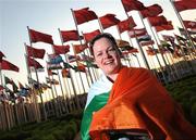 5 September 2008; Official flag bearer Patrice Dockery, from Swords, Dublin, who competes in the wheelchair track event in 100m, 200m, & 400m, prepares for the Opening Ceremony which will be held tomorrow the 6 September in the National stadium. Beijing 2008 Paralympic Games, Paralympic Athletes Village, Olympic Green, Beijing, China. Picture credit: Brian Lawless / SPORTSFILE