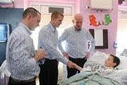 8 September 2008; Oisin O'Gorman, from Waterford, with Kilkenny manager Brian Cody and player's Henry Shefflin, centre, and Michael Kavanagh, left, during a visit to Our Lady's Hospital for Sick Chidren in Crumlin. Crumlin, Co. Dublin. Picture credit: Pat Murphy / SPORTSFILE