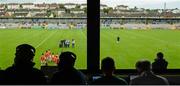 27 June 2015; The Armagh team sit for the pre-match team photograph as radio commentators make preparations ahead of the game. GAA Football All-Ireland Senior Championship, Round 1B, Armagh v Wicklow. Athletic Grounds, Armagh. Picture credit: Piaras Ó Mídheach / SPORTSFILE