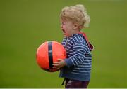 27 June 2015; 21 month old Thias Sharkey, from Ardee, and cousin of Louth footballer Ryan Burns, plays on the pitch at half-time. GAA Football All-Ireland Senior Championship, Round 1B, Louth v Leitrim. County Grounds, Drogheda, Co. Louth. Picture credit: Piaras Ó Mídheach / SPORTSFILE