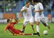 10 September 2008; Kevin Doyle, Republic of Ireland, in action against Jovan Tanasijevic, Montenegro. 2010 World Cup Qualifier, Montenegro v Republic of Ireland, City Stadium, Podgorica, Montenegro. Picture credit; David Maher / SPORTSFILE