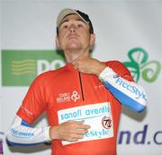 27 August 2008; Matt Wilson, Team Type 1 Cycling Team, after being presented with the King of the Mountains red jersey. 2008 Tour of Ireland - Stage 1, Dublin - Waterford. Picture credit: Stephen McCarthy / SPORTSFILE  *** Local Caption ***