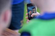 30 June 2015; Leinster Rugby's Kevin McLaughlin and Aaron Dundon headed out to the Bank of Ireland Leinster Rugby Summer Camps in Donnybrook Stadium to meet up with some local young rugby talent. Pictured is Ronan Byrne, aged 11, from Newtownmountkennedy, Co. Wicklow, as he takes a selfie with Leinster's Aaron Dundon during the Bank of Ireland Leinster Rugby Summer Camps 2015. Donnybrook Stadium, Donnybrook, Dublin. Picture credit: Dáire Brennan / SPORTSFILE