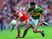 20 August 2000; Mike McCarthy of Kerry in action against Steven McDonnell of Armagh during the Bank of Ireland All-Ireland Senior Football Championship Semi-Final match between Kerry and Armagh at Croke Park in Dublin. Photo by Ray McManus/Sportsfile
