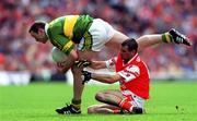 20 August 2000; Seamus Moynihan of Kerry in action against Steven McDonnell of Armagh during the Bank of Ireland All-Ireland Senior Football Championship Semi-Final match between Kerry and Armagh at Croke Park in Dublin. Photo by Ray McManus/Sportsfile