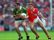 20 August 2000; Seamus Moynihan of Kerry in action against Paddy McKeever of Armagh during the Bank of Ireland All-Ireland Senior Football Championship Semi-Final match between Kerry and Armagh at Croke Park in Dublin. Photo by Ray McManus/Sportsfile