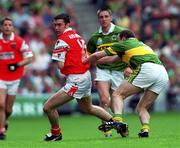 20 August 2000; Oisin McConville of Armagh in action against Seamus Moynihan of Kerry during the Bank of Ireland All-Ireland Senior Football Championship Semi-Final match between Kerry and Armagh at Croke Park in Dublin. Photo by Ray McManus/Sportsfile